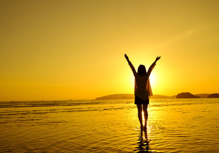 Relax Woman  jumping sea on the beach